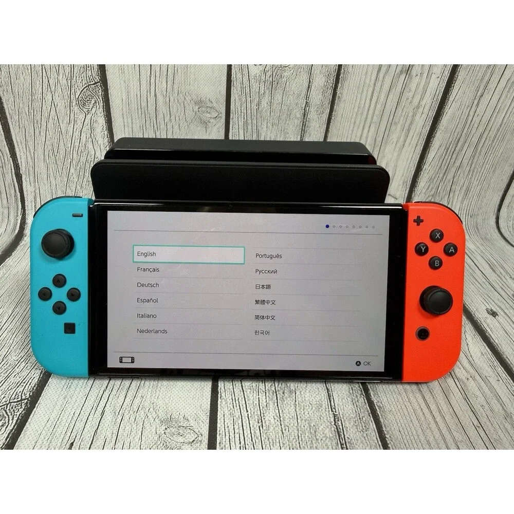 Nintendo Switch OLED Blue Red Bundle Mint Condition Used Twice Adult Owned Case